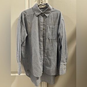 Oversized style blue stripped linen shirt